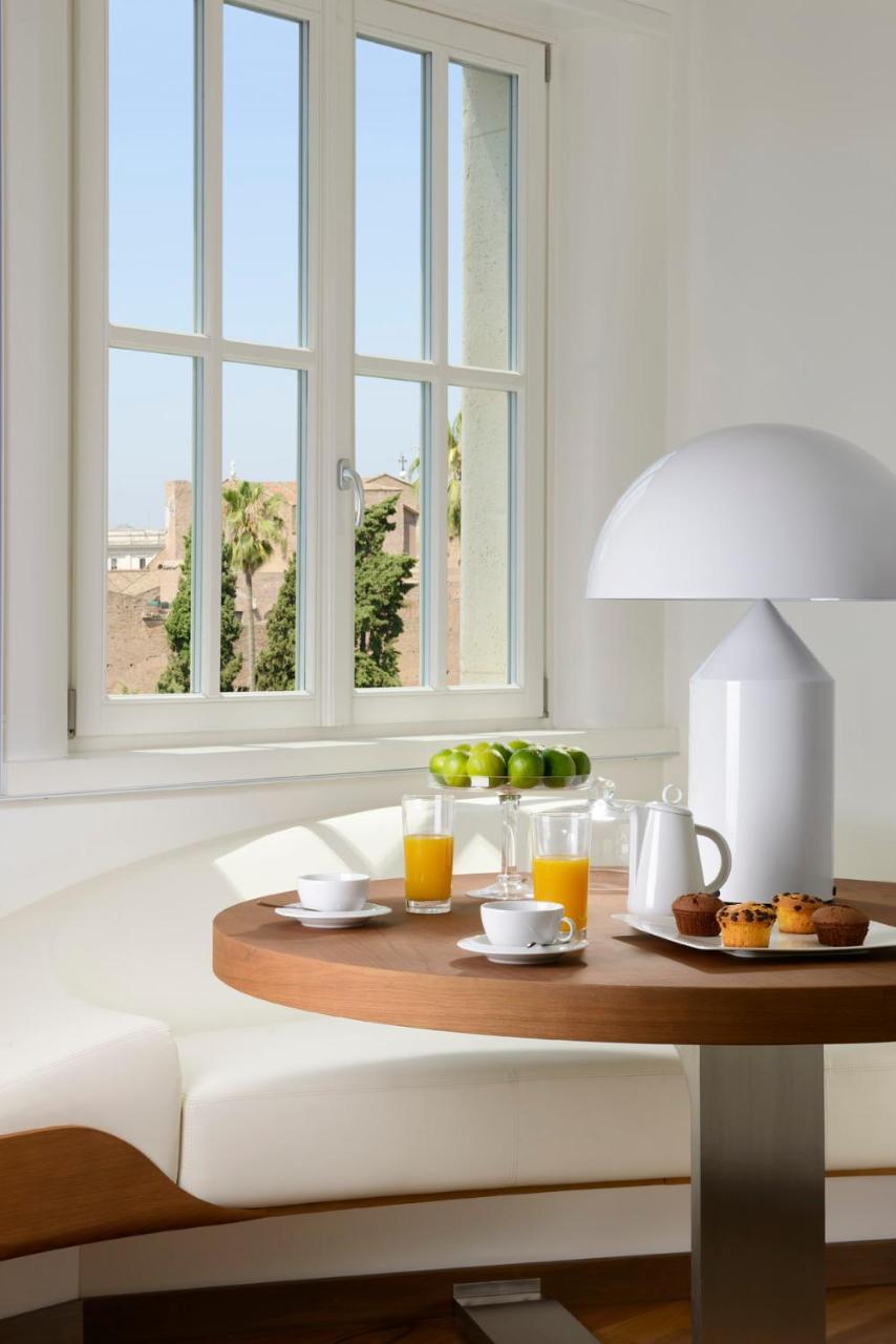 Palazzo Montemartini Rome, A Radisson Collection Hotel Exterior photo A lamp by Artemide